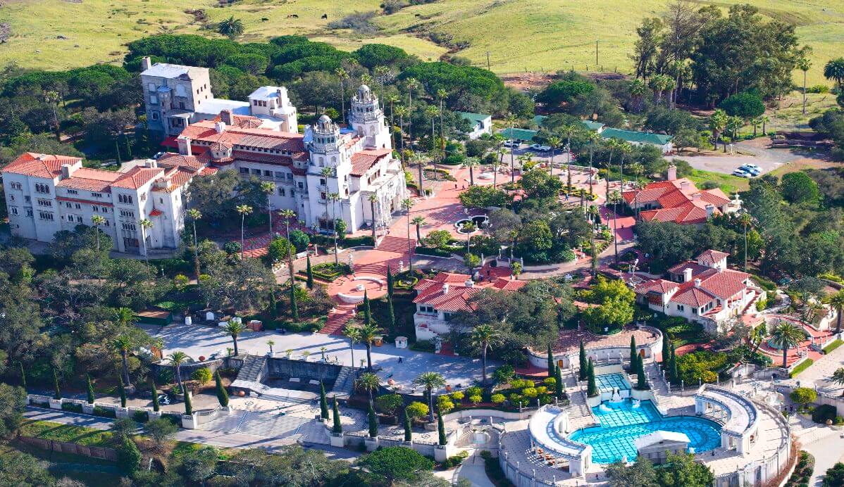 aerial-view-of-a-castle-on-a-hill--hearst-castle--san-simeon--san-luis-obispo-county--california--usa-157861956-5c223a06c9e77c0001d442b1.jpg